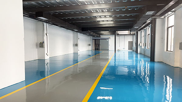 慧氟高分子材料有限公司新工廠再次選用地衛(wèi)士地坪漆施工